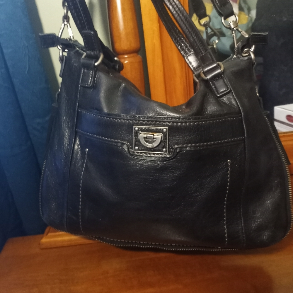 The Sak Black Leather/Suede with Tassels Handbag

Pet & smoke free!
